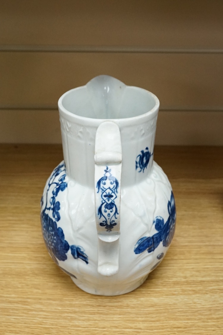 A Caughley blue and white transfer printed mask jug, c. 1780, 21cm high